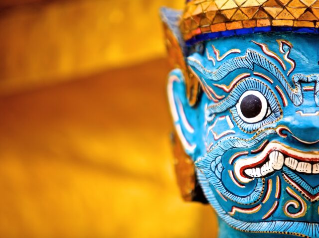 The beautiful Giant statue at the base of Gold pagoda in Wat Phra Kaew, Bangkok, Thailand.
