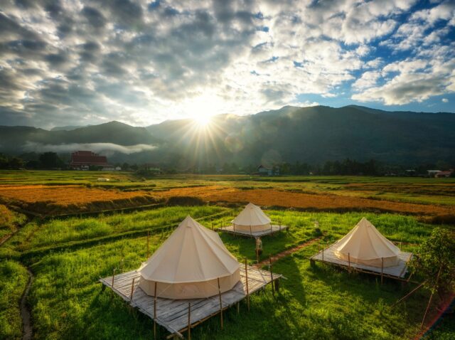 Countryside homestay in rice farm in Pua District, Nan province, Thailand. This image can use for home stay, hotel, resort, holiday, travel, park and outdoor concept