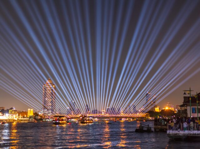 Phra Phuttha Yodfa Bridge or Memorial Bridge light up with fireworks event show. ‘Vijit Chao Phraya’ lighting extravaganza with firework at Memorial Bridge, Bangkok, Thailand