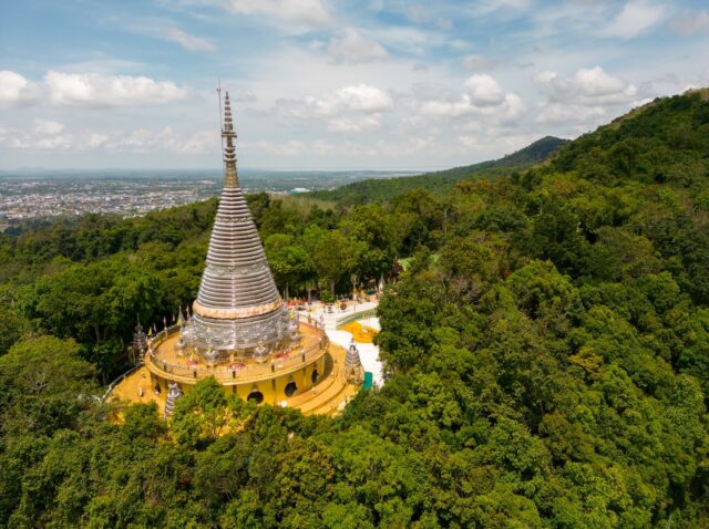Hat Yai, Thailand - February 10, 2023: Wat Stainless Steel is a contemporary chedi Thai temple built from stainless steel and is located in Hat Yai, Thailand.