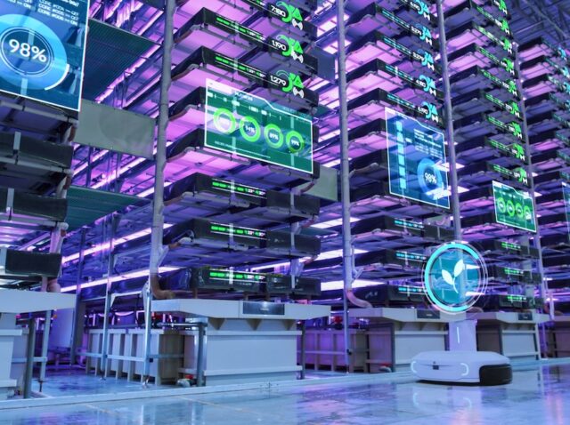 Vertical Farming Facility with Automated Robots: Vehicles Transporting Sustainably Grown Organic Vegetables. Digital Visualization with Stats, Analytics for AI Controlled Complex Hydroponics System