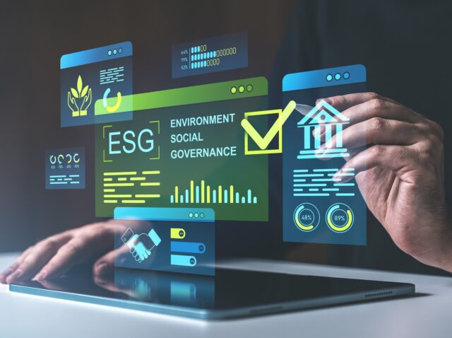 Hands interacting with an ESG investment hologram featuring environmental, social, and governance data over a tablet on a dark background