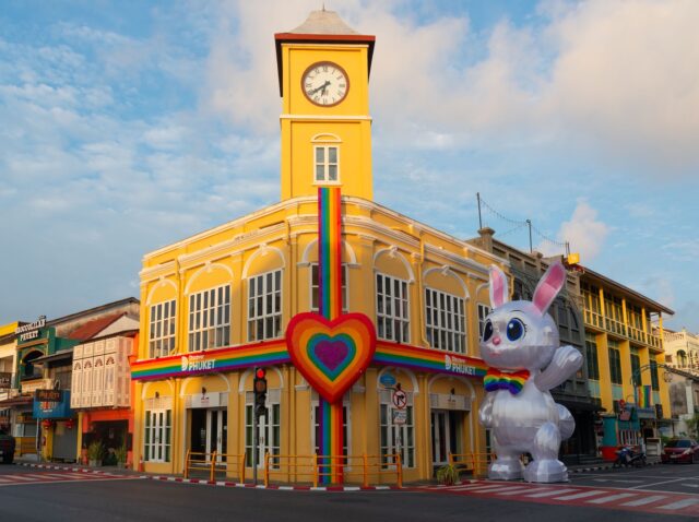 Phuket, Thailand-June 1, 2025: View of the old chino-portuguese building style in the city of Phuket adorned with rainbow decorations and a large heart symbol in celebration of LGBTQ+ pride