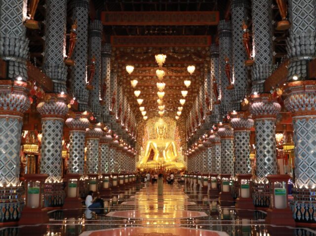 Chiang Mai, Thailand – 9 August, 2025 : Tourists visiting Wat Sri Don Moon temple, Beautiful Buddhist temple with golden pagoda, cultural tourism, travel landmark, Lanna architecture.