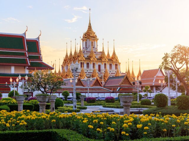 Beautiful sky and Wat Ratchanatdaram Temple in Bangkok, Thailand. Thai architecture: Wat Ratchanadda, Loha Prasat and Traditional Thai pavilion is among the best of Thailand's landmarks.